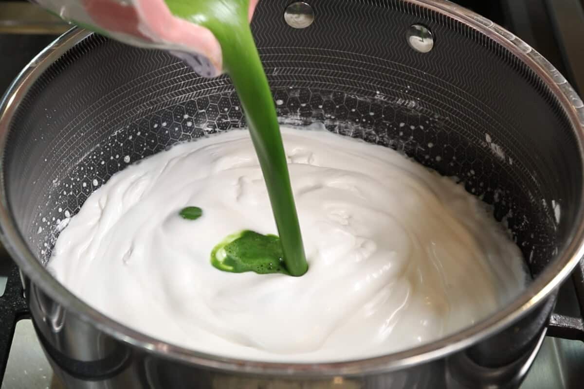 pouring matcha into pot for Vegan Matcha Crème Brûlée