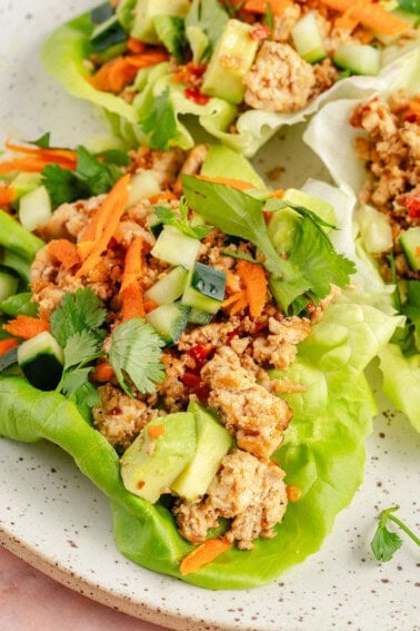 close up of chili lime tofu lettuce wraps on a plate
