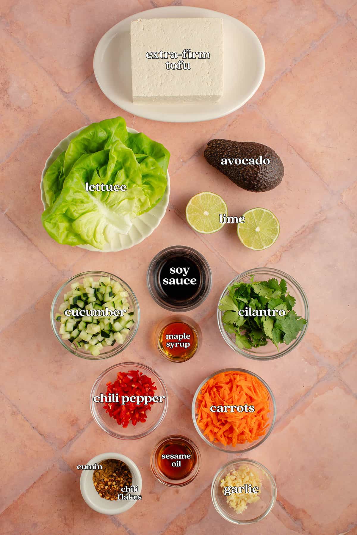 extra-firm tofu, lettuce, avocado, lime, soy sauce, cucumber, cilantro, maple syrup, chili pepper, carrots, sesame oil, cumin, chili flakes, garlic