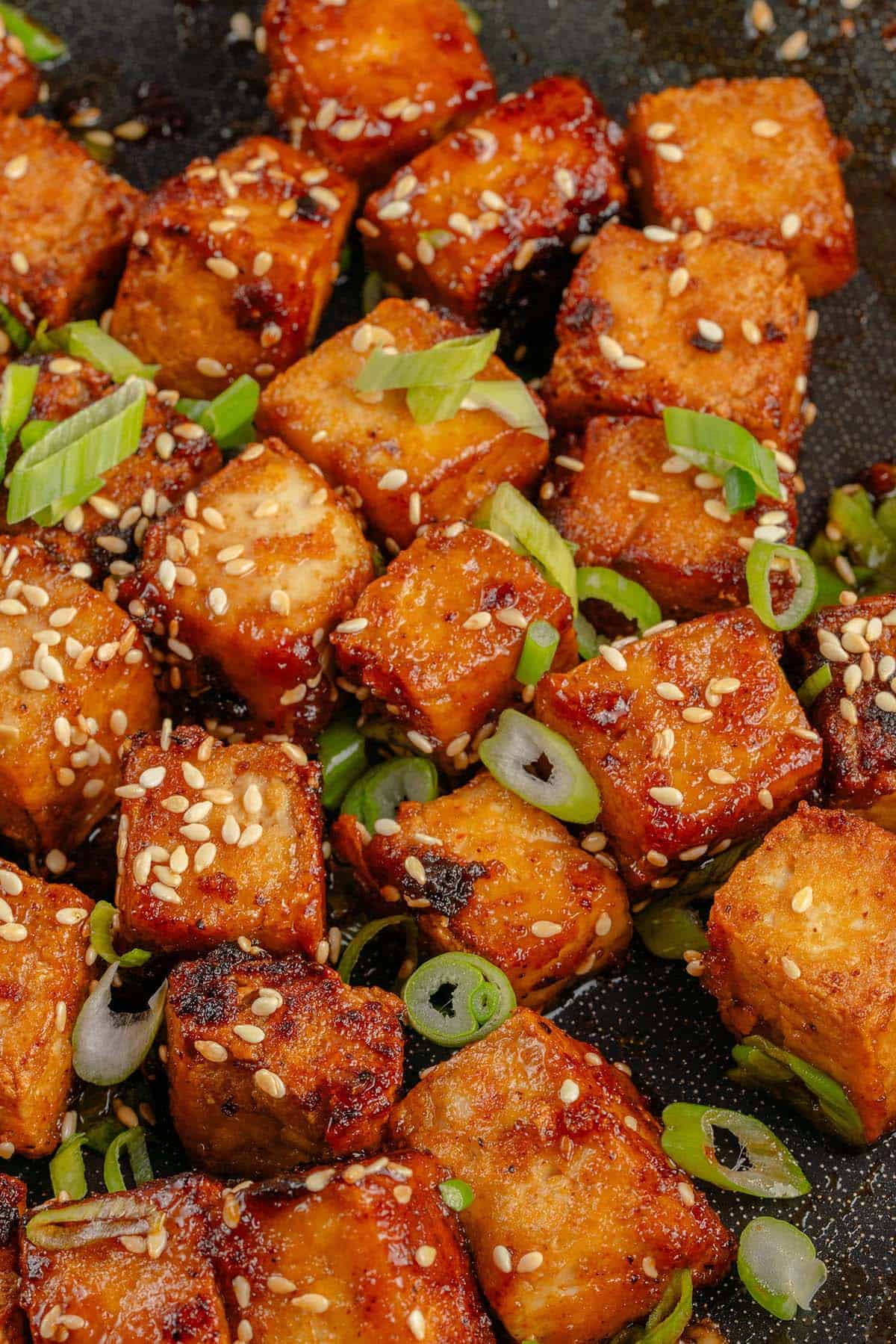 pan fried maple glazed tofu with sesame seeds and green onions