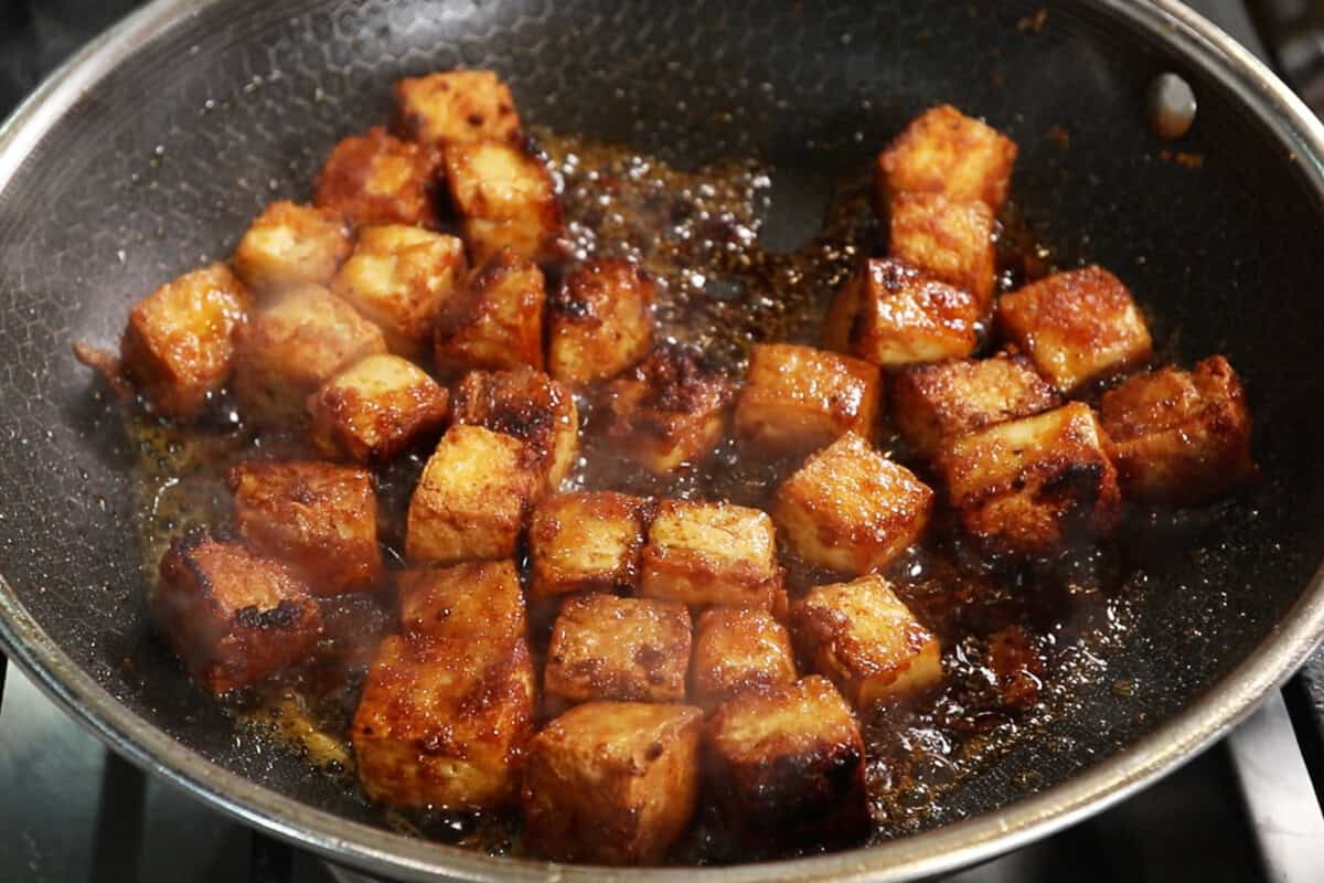 pan frying maple glazed tofu with sauce