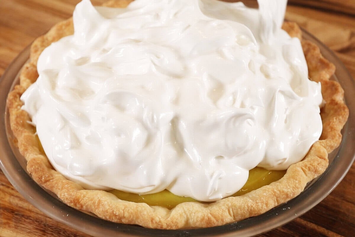 horizontal photo of lemon meringue pie before torching
