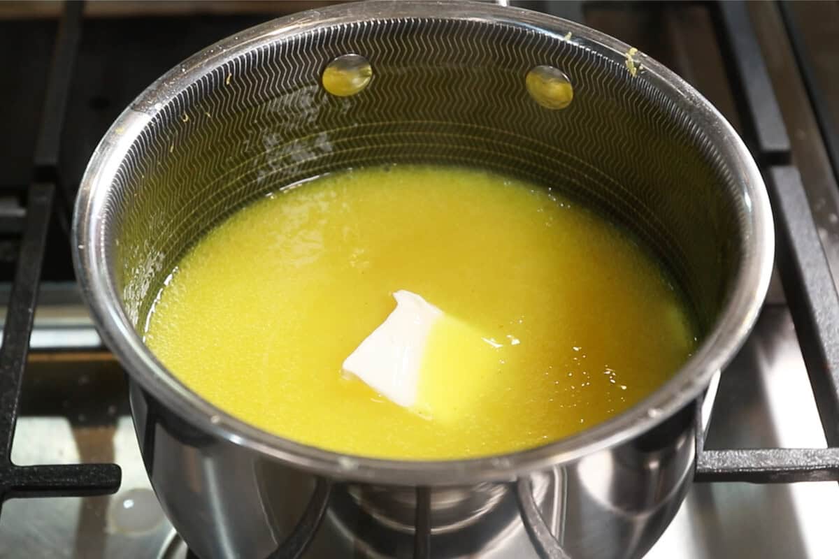 melting cold butter into lemon curd