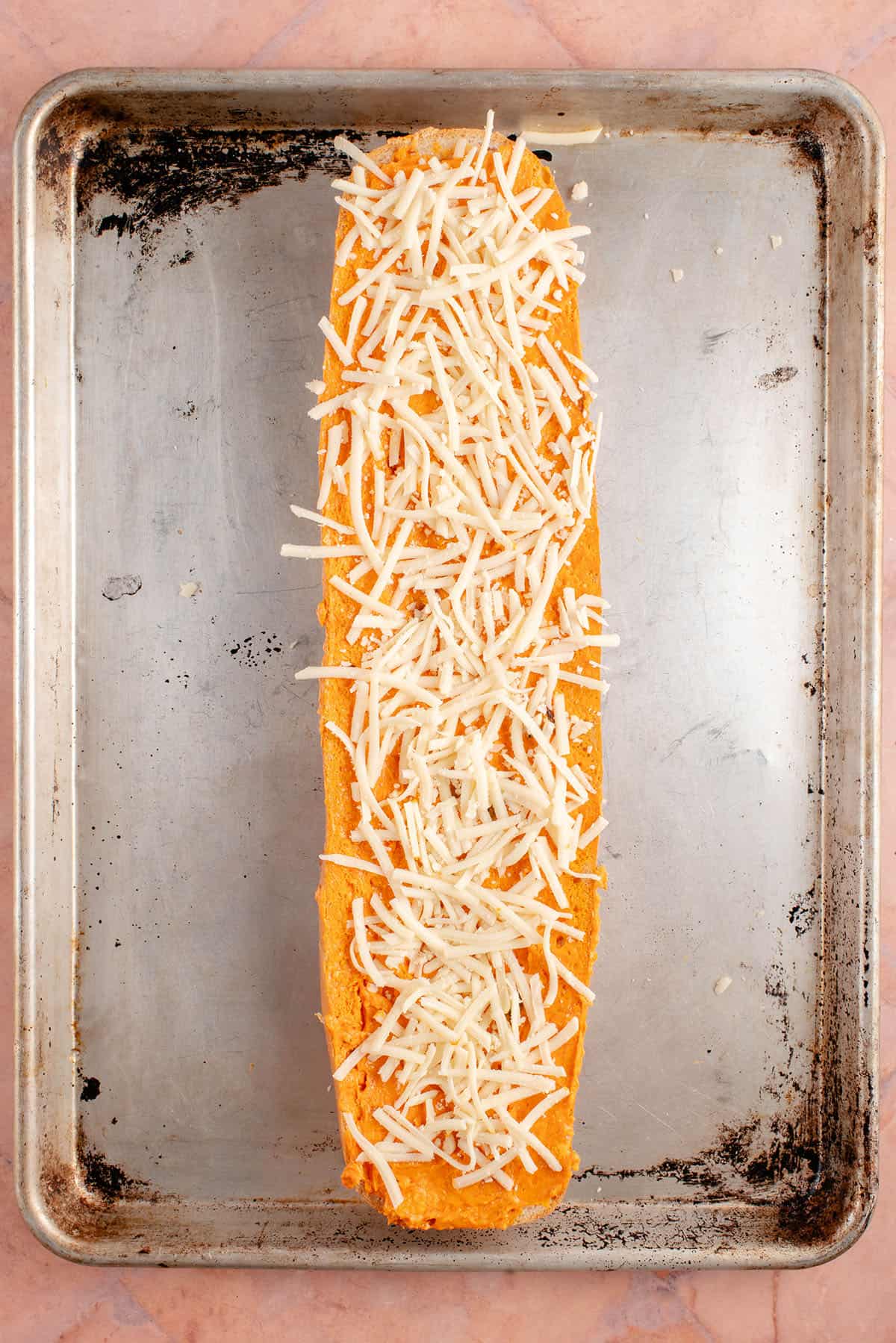 unbaked gochujang garlic bread on a baking sheet