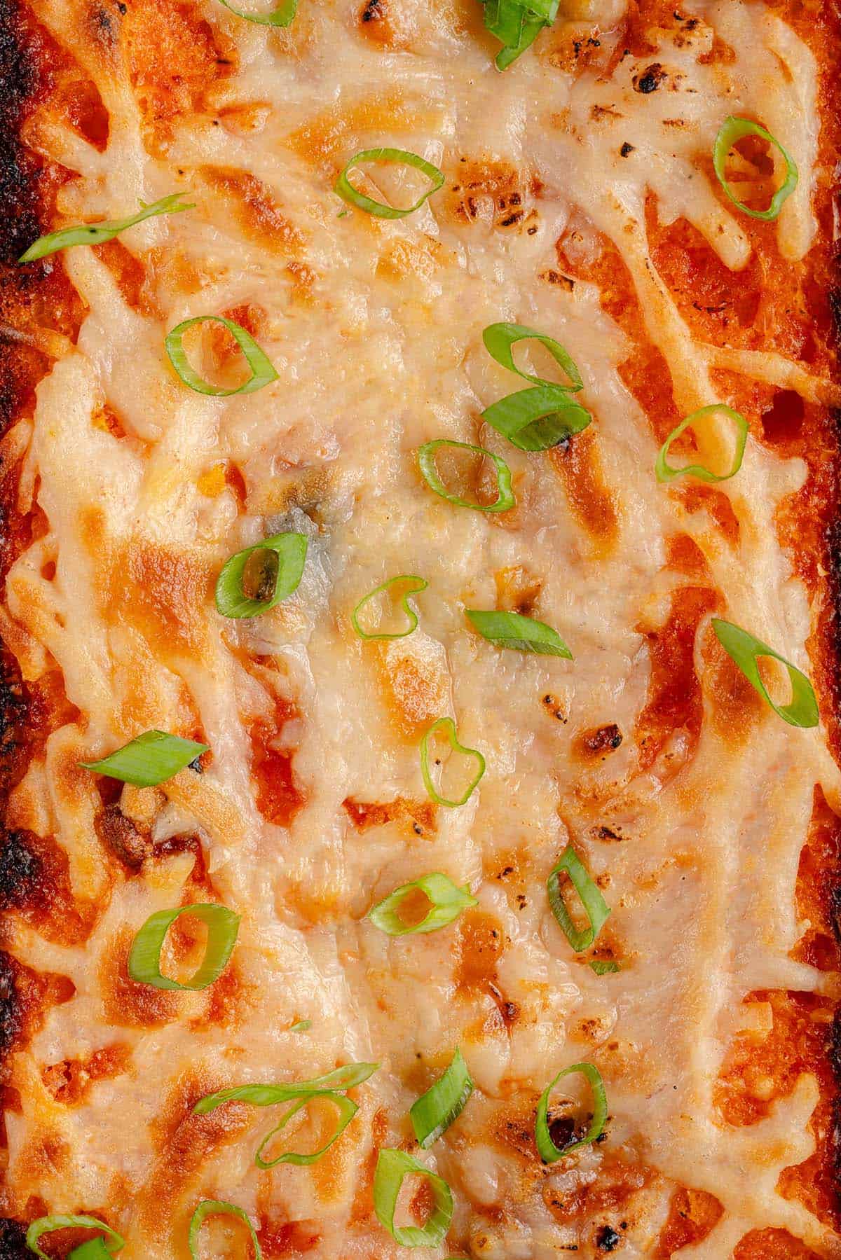 close up of cheesy gochujang garlic bread