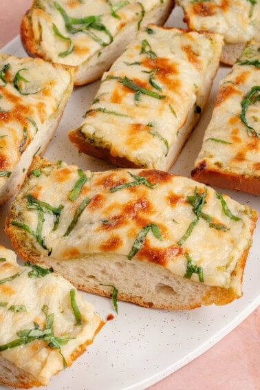 slices of cheesy pesto garlic bread