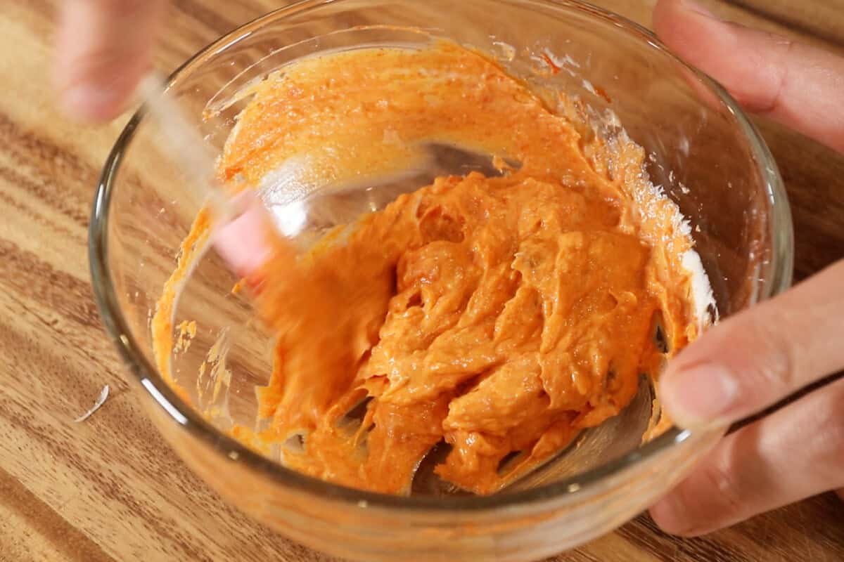mixing gochujang garlic butter
