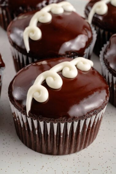 vegan copycat hostess cupcakes on white plate
