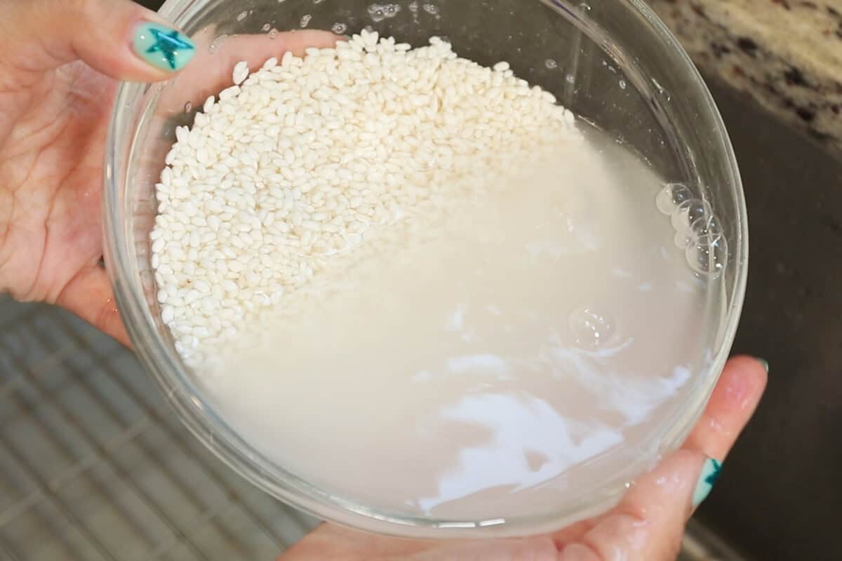 washing glutinous (sweet) rice for mango sticky rice recipe