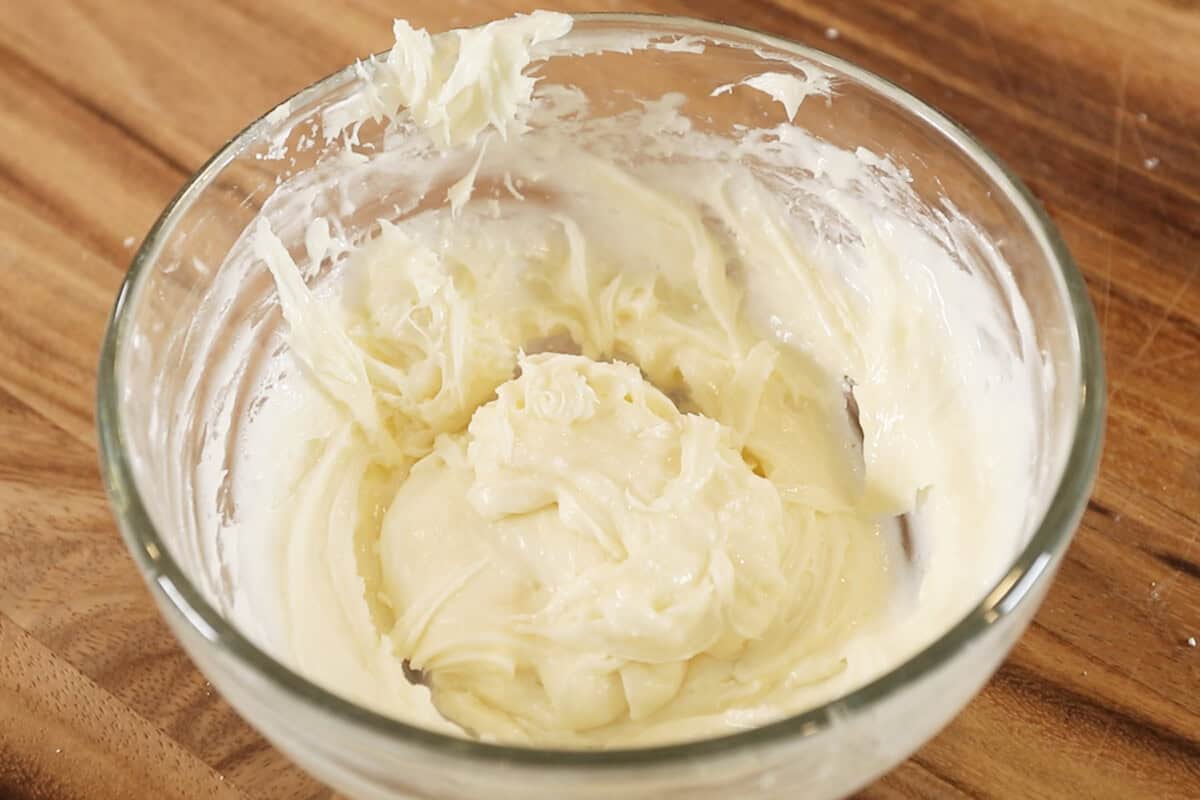 mixing the icing in small bowl