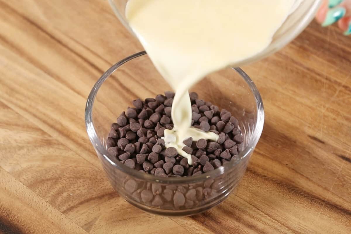 adding dairy-free heavy cream to chocolate chips