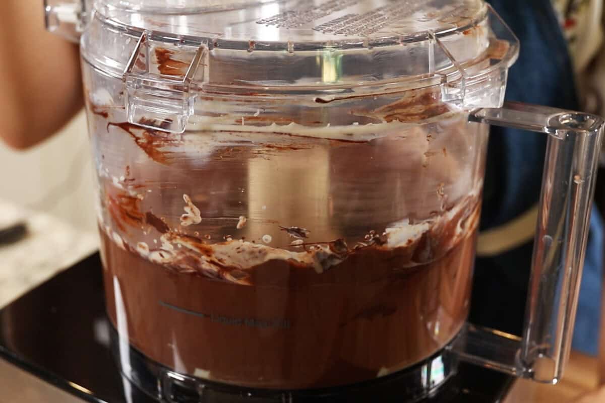 preparing a chocolate filling for S'mores Pie in a food processor
