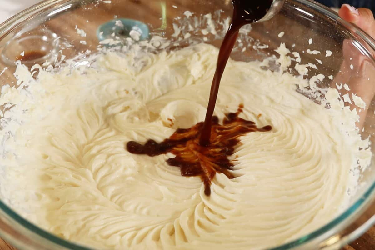 adding espresso to the cream filling