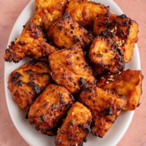 air fried miso sesame tofu piled on a plate