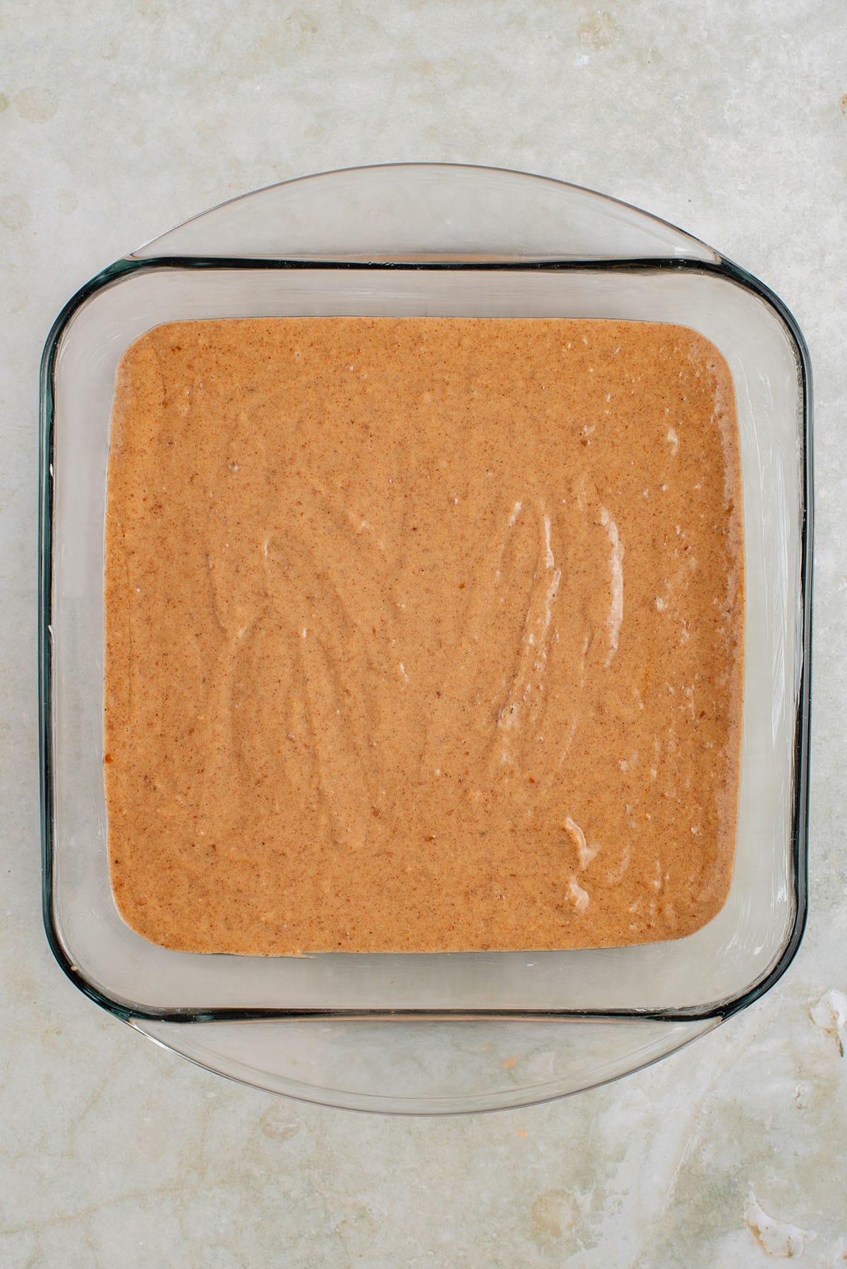 unbaked toffee pudding in baking dish