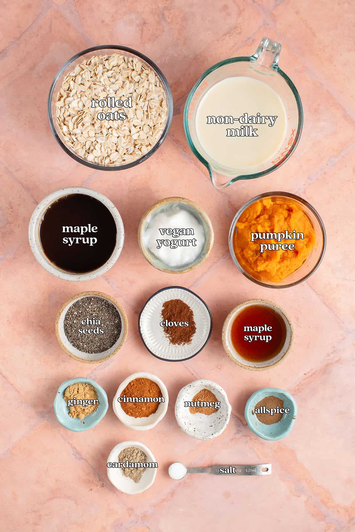 rolled oats, non-dairy milk, maple syrup, vegan yogurt, pumpkin puree, chia, cloves, maple syrup, ginger, cinnamon, nutmeg, allspice, cardamom, salt