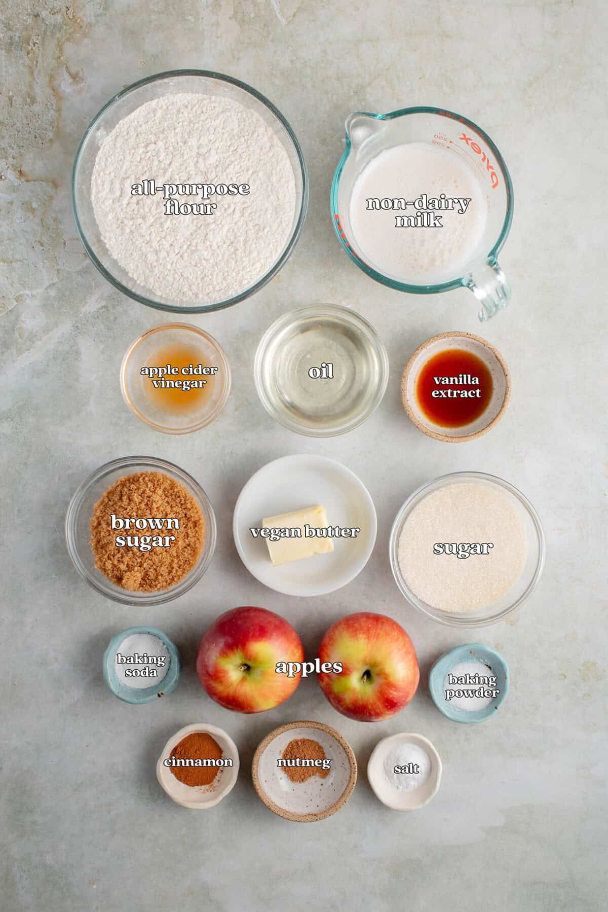 all purpose flour, non dairy milk, apple cider vinegar, oil, vanilla extract, brown sugar, vegan butter, sugar, baking soda, apples, baking powder, cinnamon, nutmeg, salt