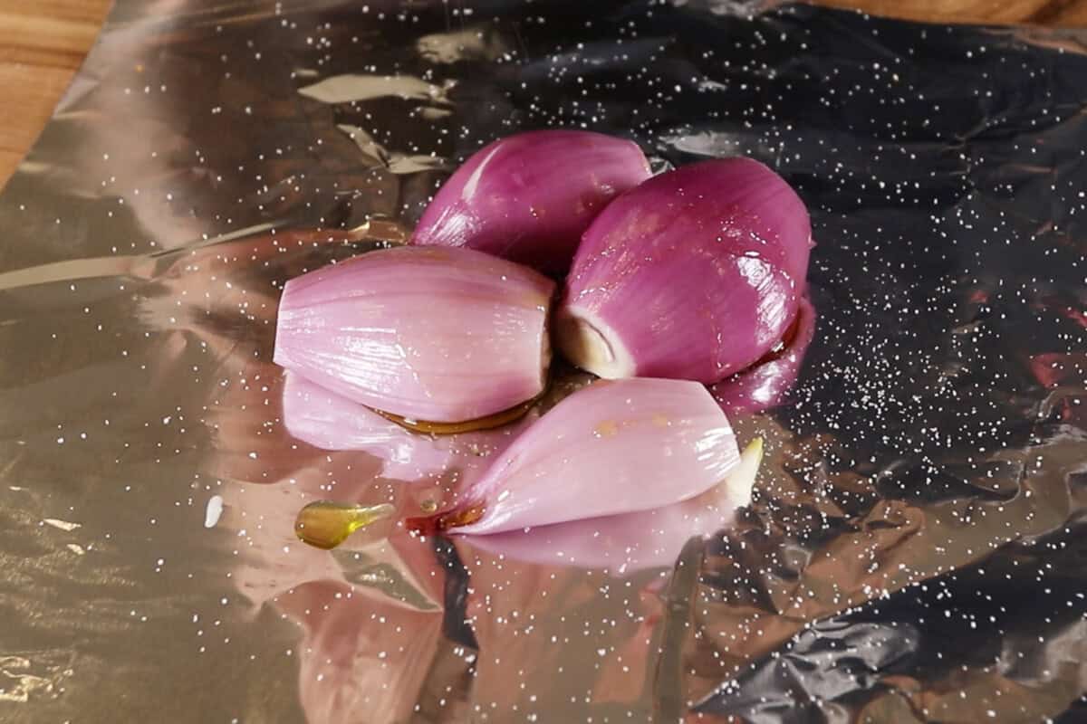 shallots seasoned with oil and salt in foil