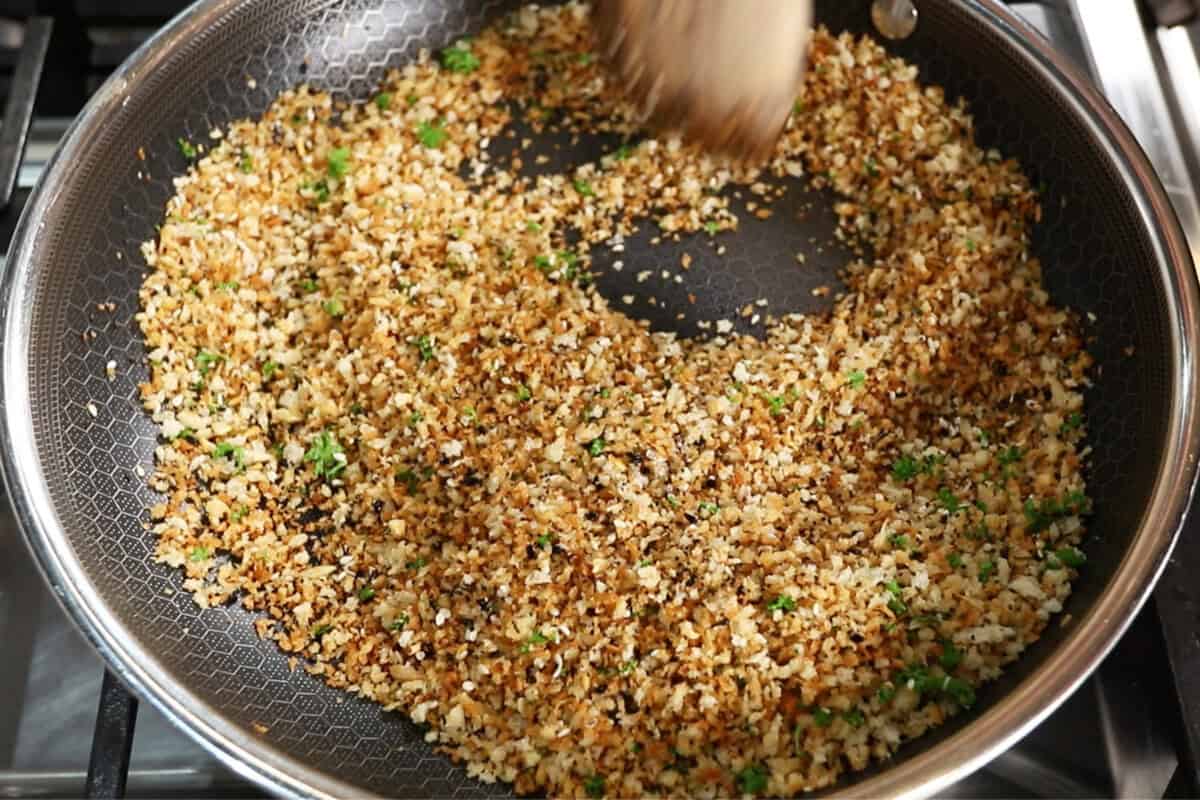 browning panko breadcrumbs in skillet