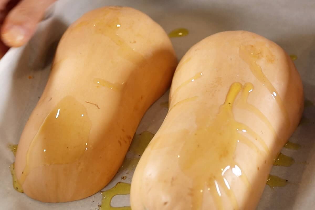 putting the butternut squash in the oven