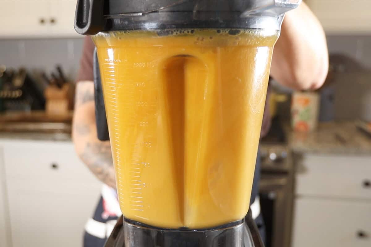 blending broth and roasted butternut squash