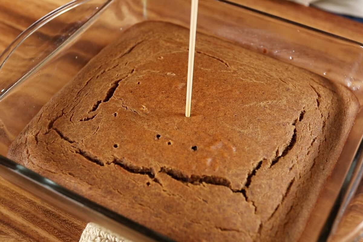 poking holes in toffee pudding