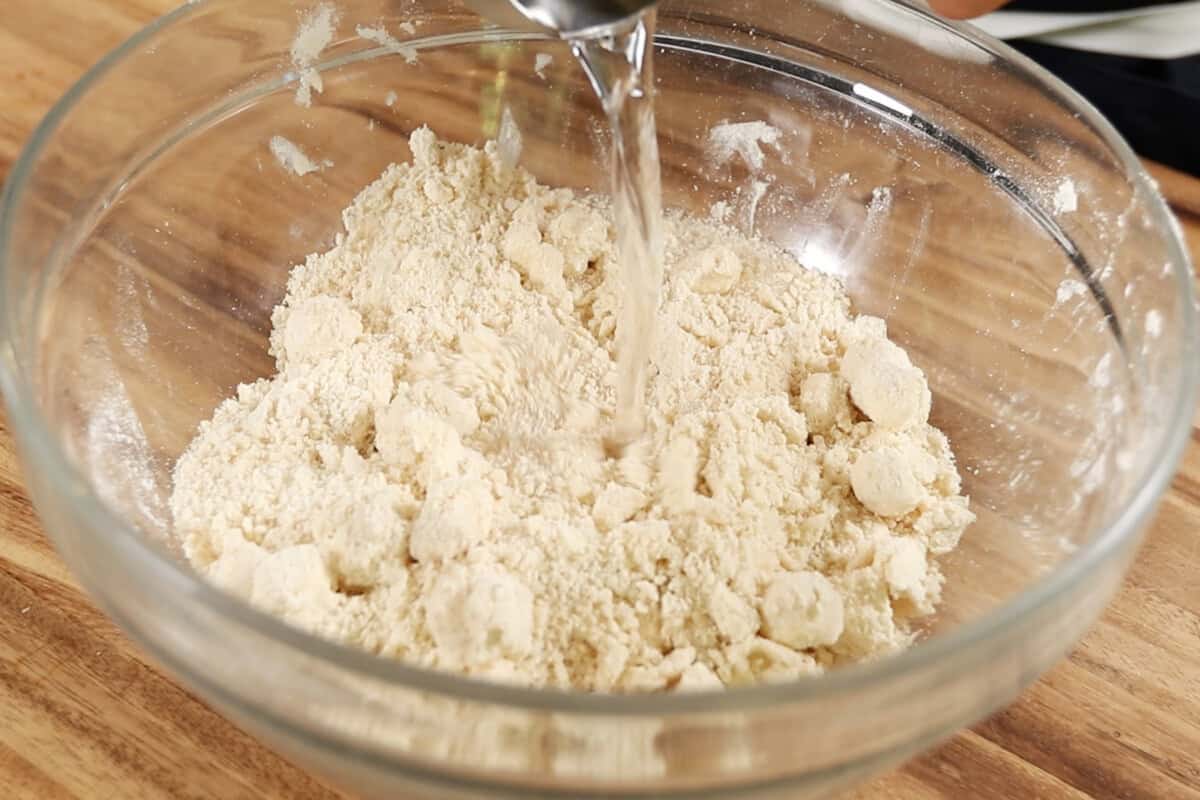 making homemade pie crust in large glass bowl