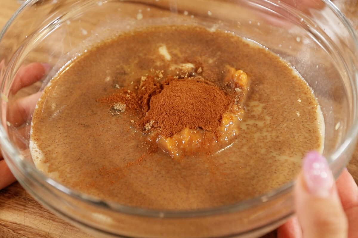 adding spices to bowl