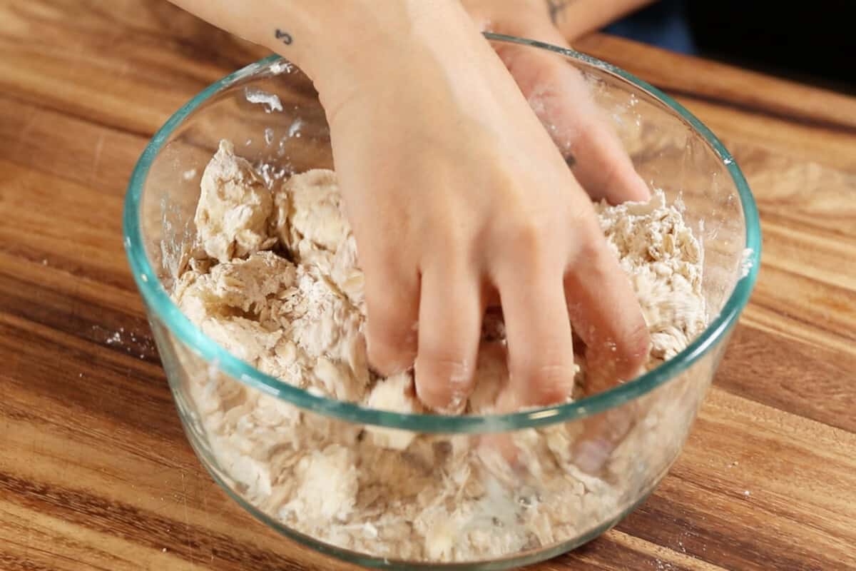 mixing the crumble topping in a bowl