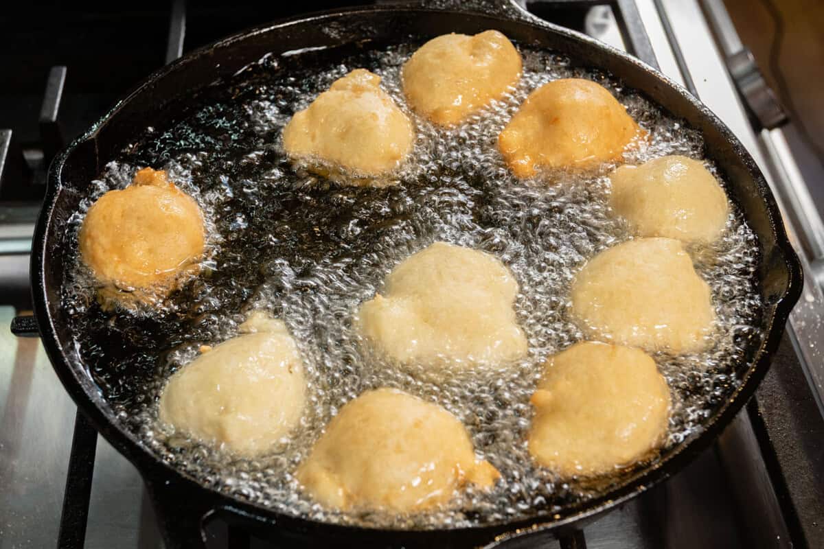 frying zeppole in skillet