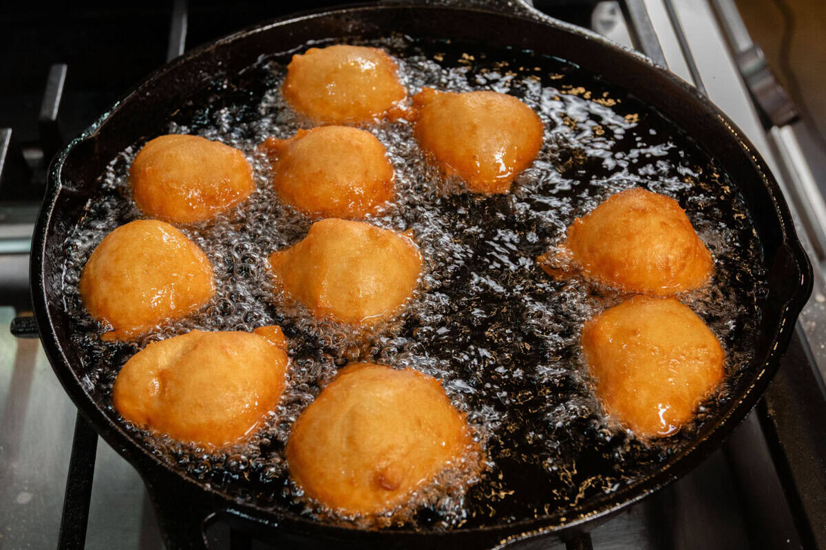 frying zeppole in skillet