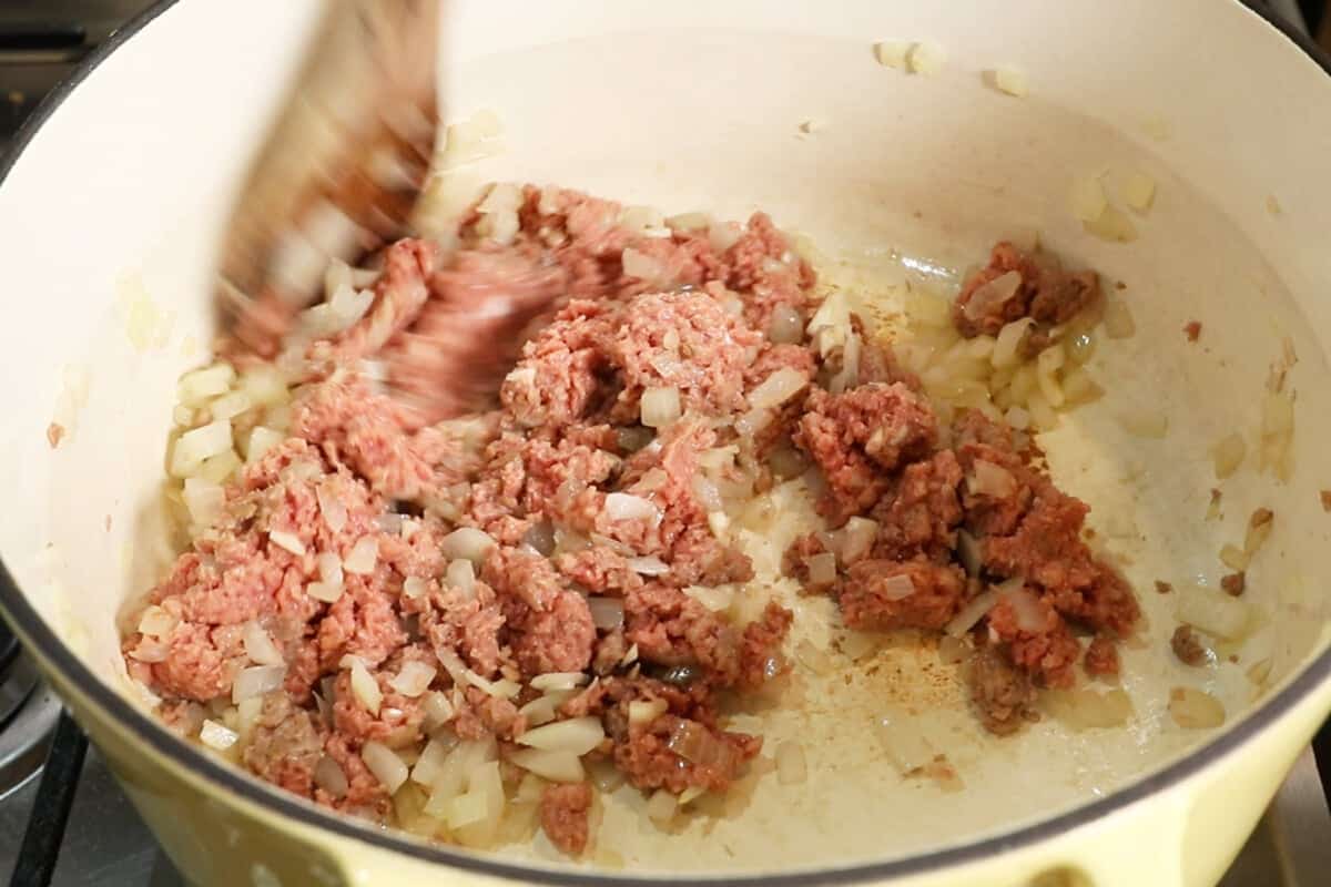 sautéing vegan beef and onions