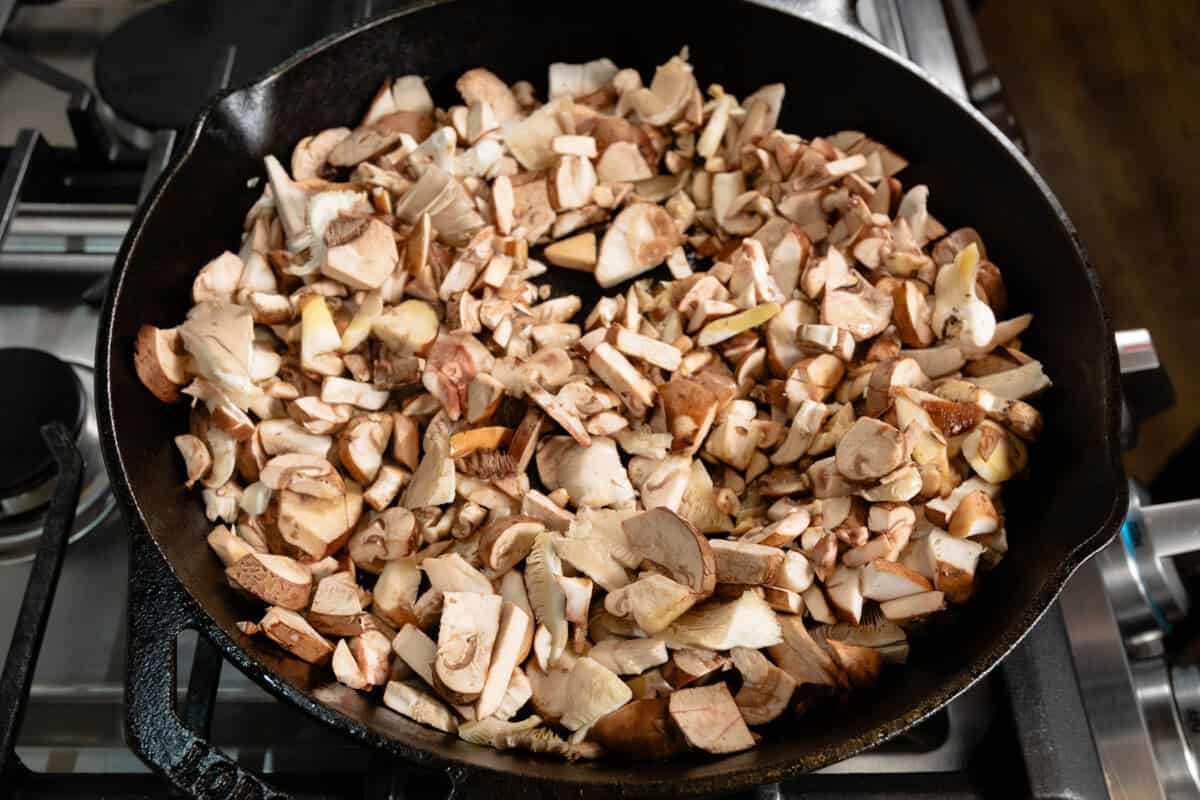 cooking mushrooms in large cast iron skillet for pot pie
