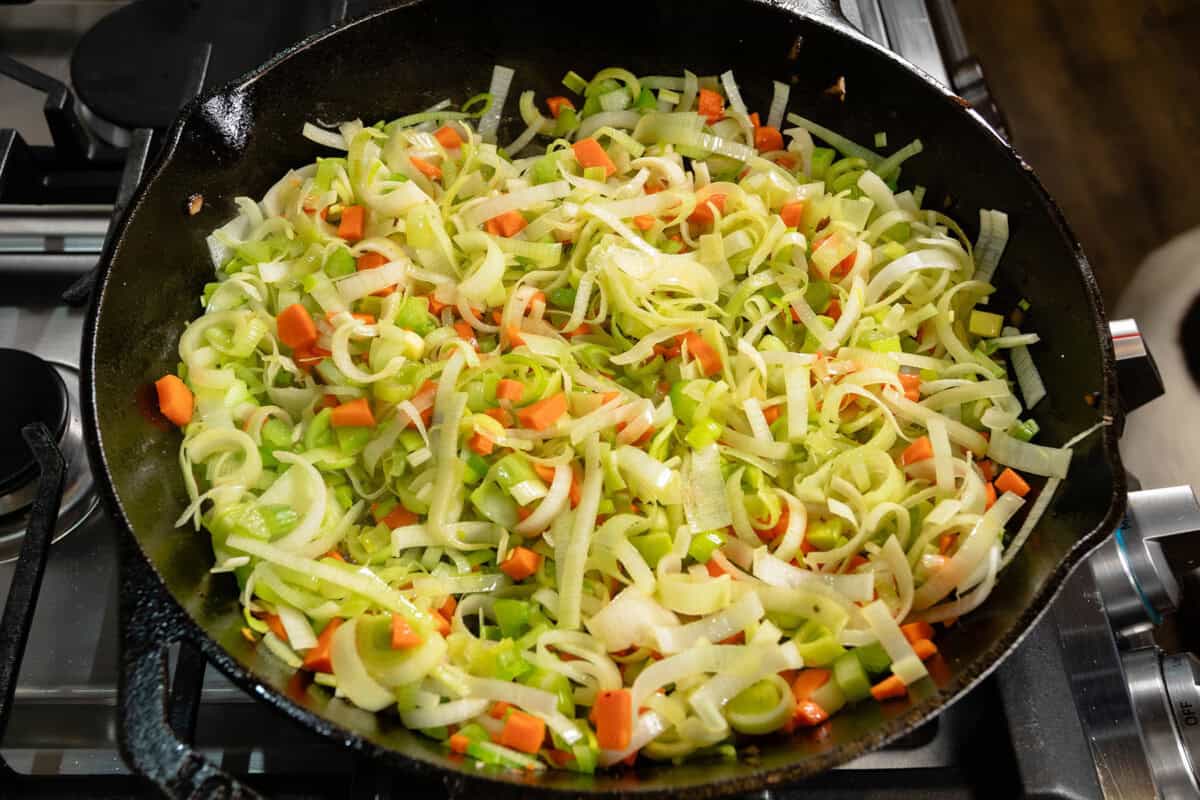 cooking carrots, celery and leeks in large cast iron skillet for pot pie