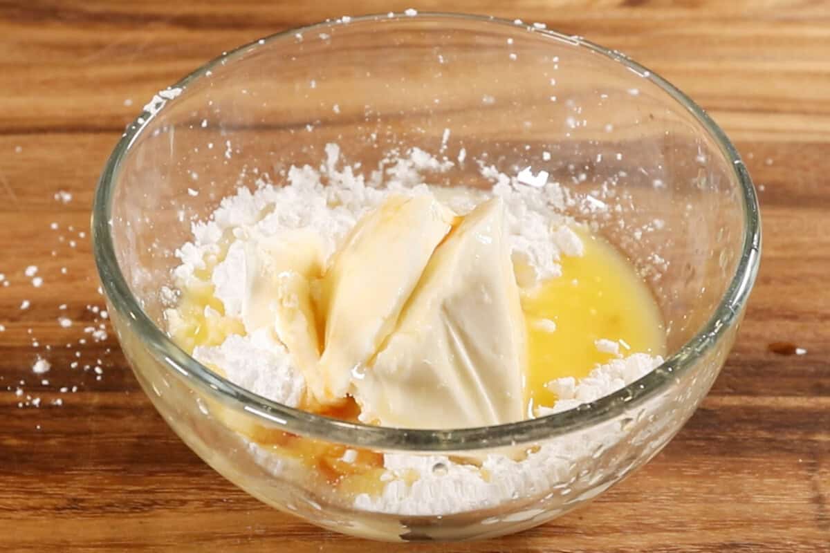 icing ingredients in a bowl before mixing