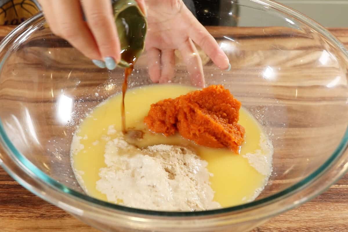 adding vanilla to large bowl