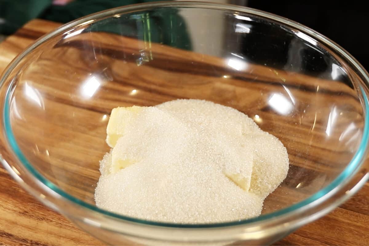 butter and sugar in large glass bowl for cookies
