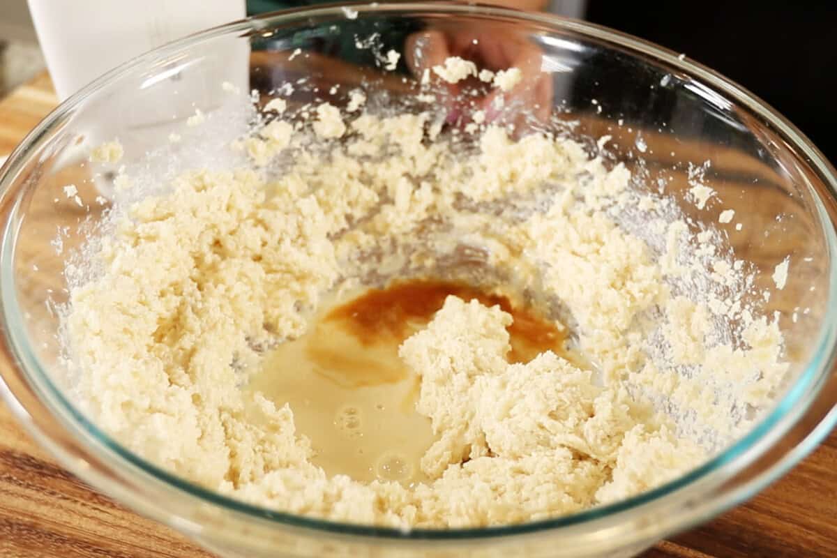preparing Strawberry Matcha Sugar Cookie dough in large glass bowl