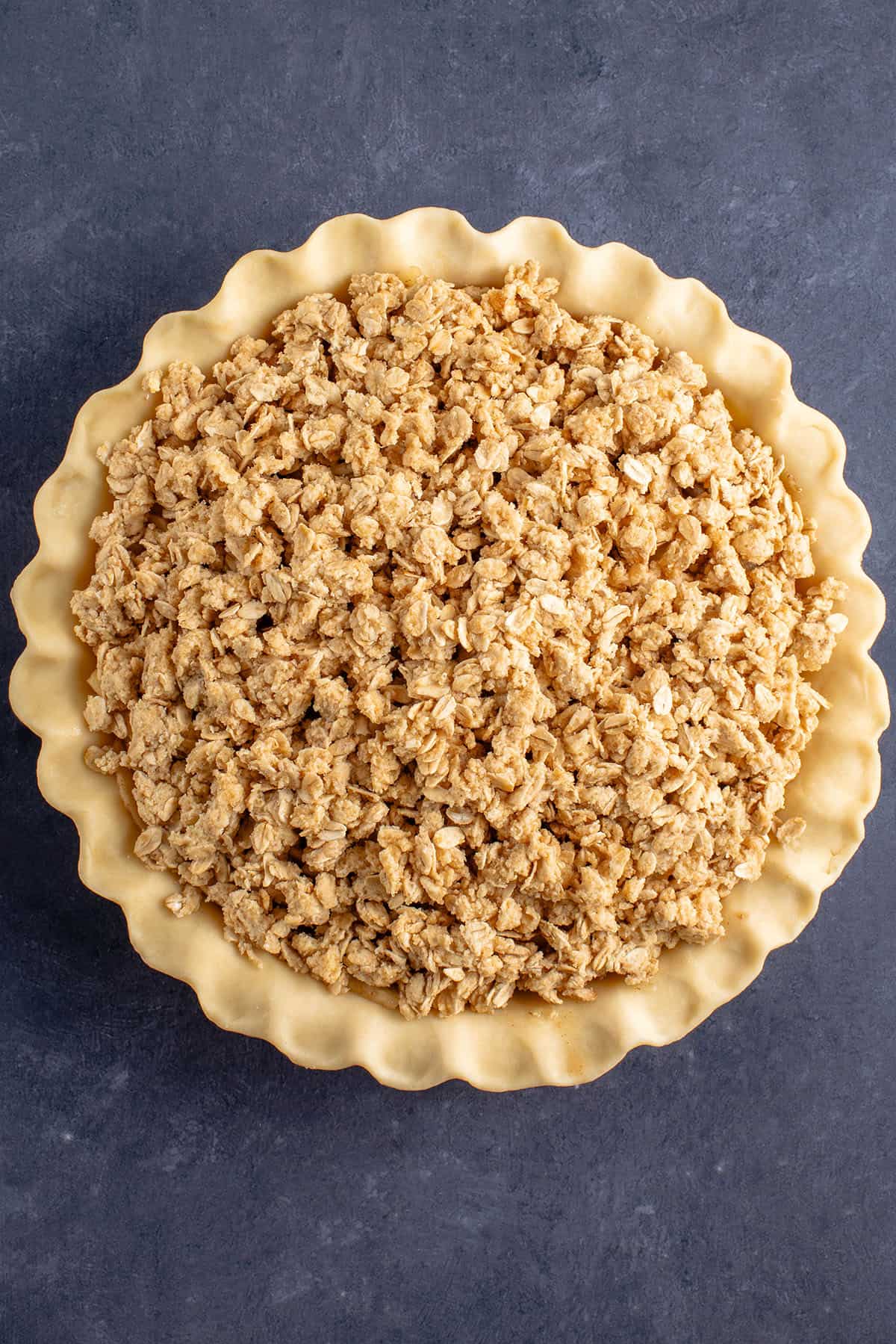 apple crumble pie before being baked