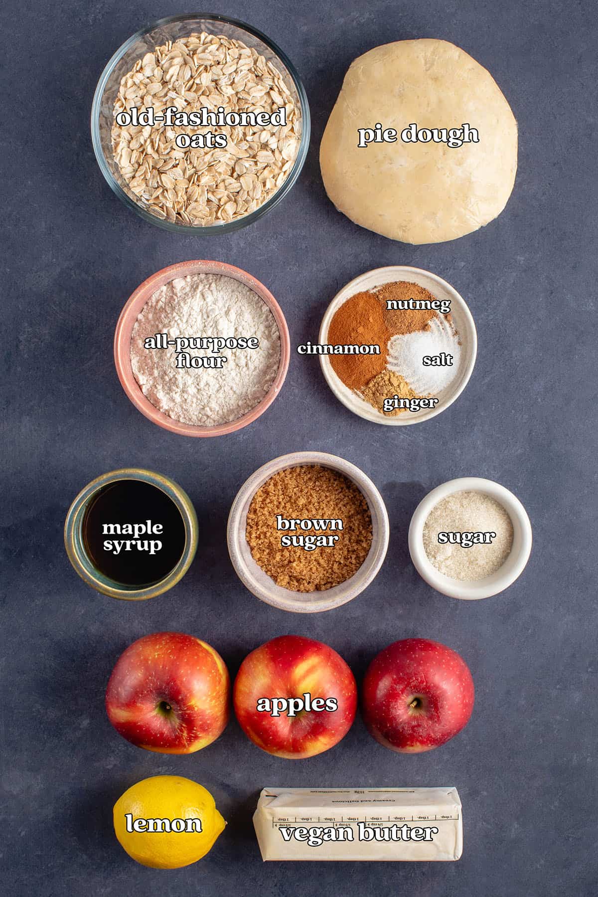 old-fashioned oats, pie dough, all purpose flour, cinnamon, nutmeg, salt, ginger, maple syrup, brown sugar, sugar, apples, lemon, vegan butter