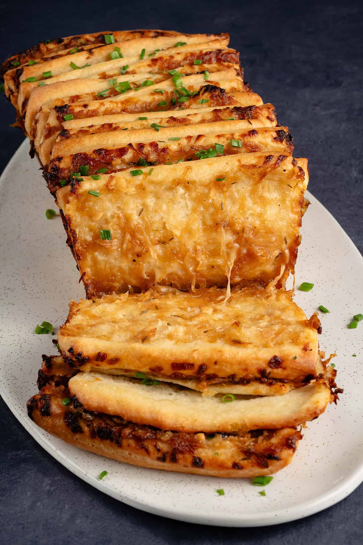 French Onion Pull Apart Bread serve on a white platter
