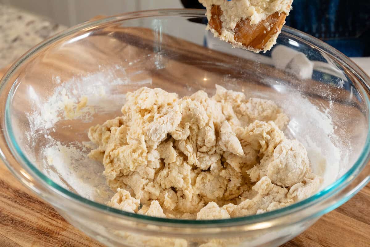 mixing the dough for French Onion Pull Apart Bread in large glass bowl