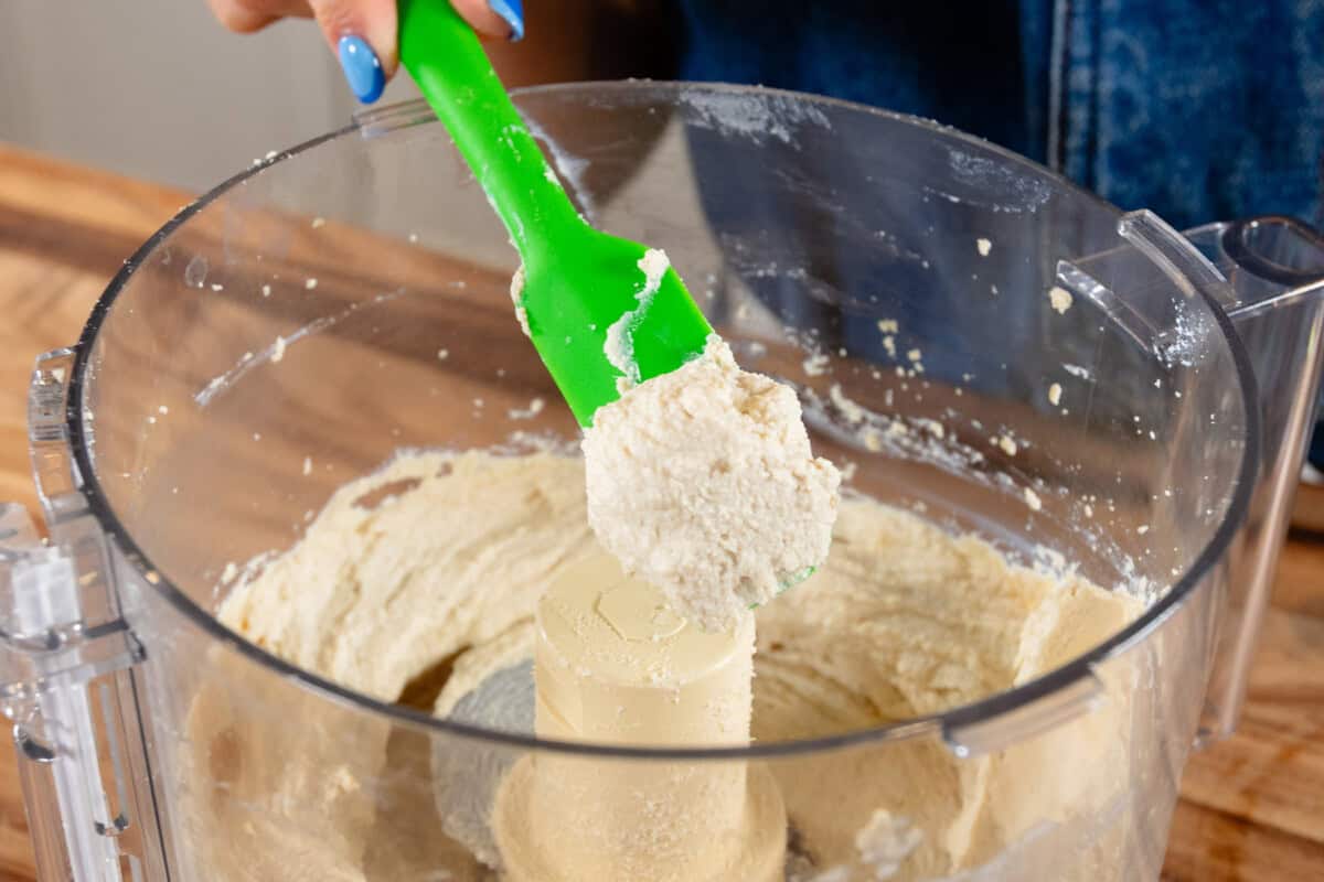 ricotta filling being scooped by a spatula