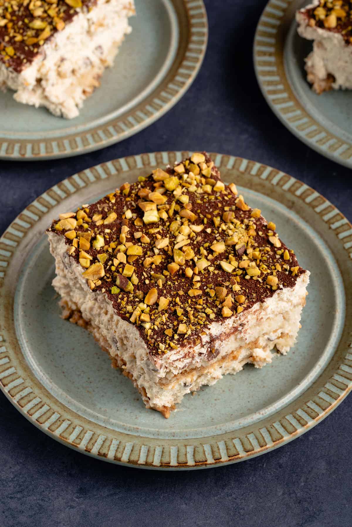 vegan cannoli tiramisu on a blue plate