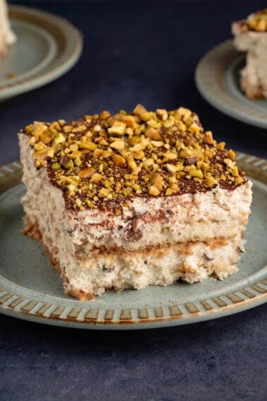 vegan cannoli tiramisu on a blue plate