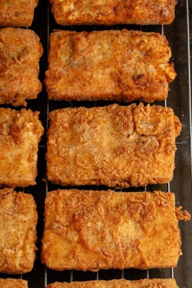tofu fried chicken cutlets on wire rack