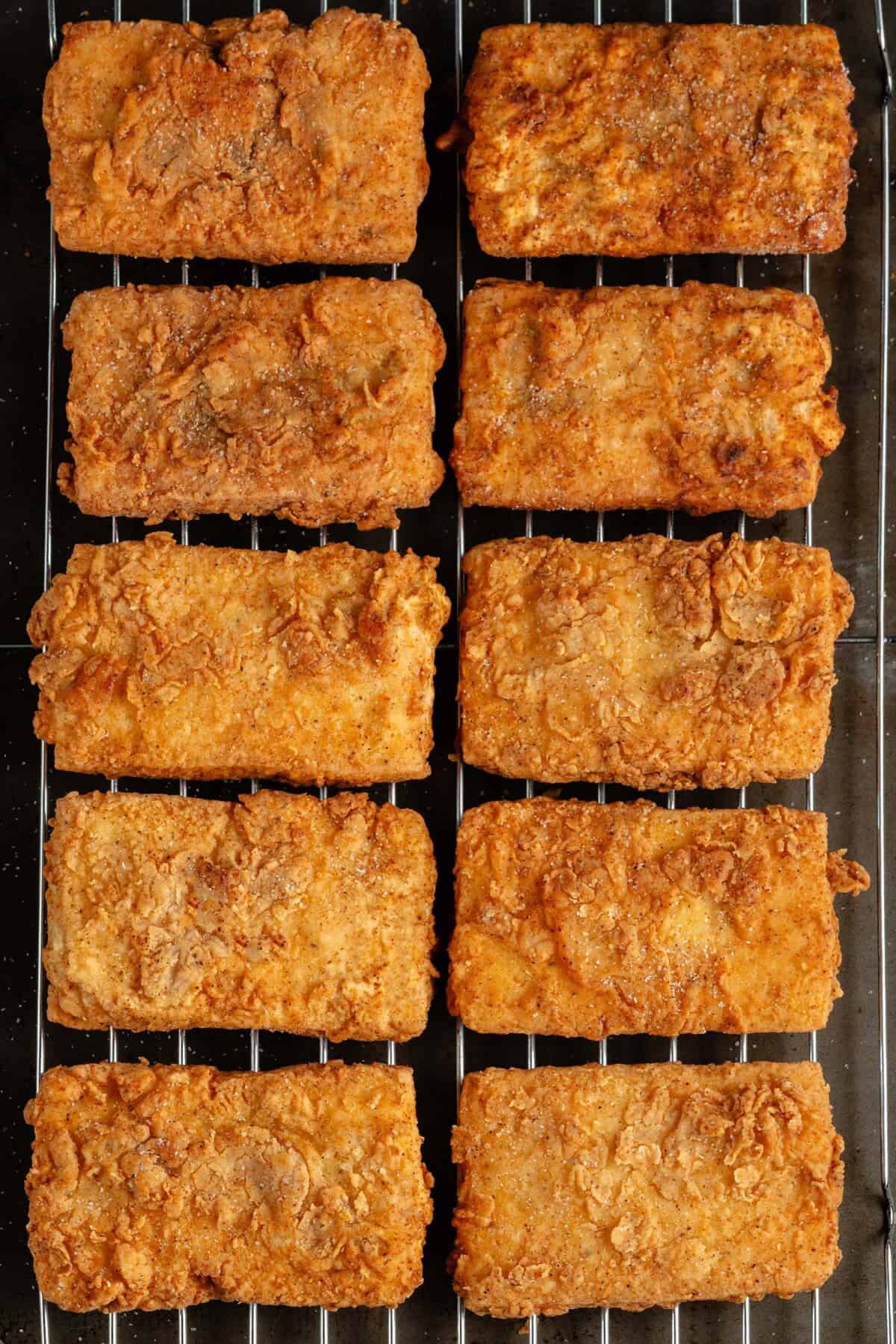tofu fried chicken cutlets on wire rack