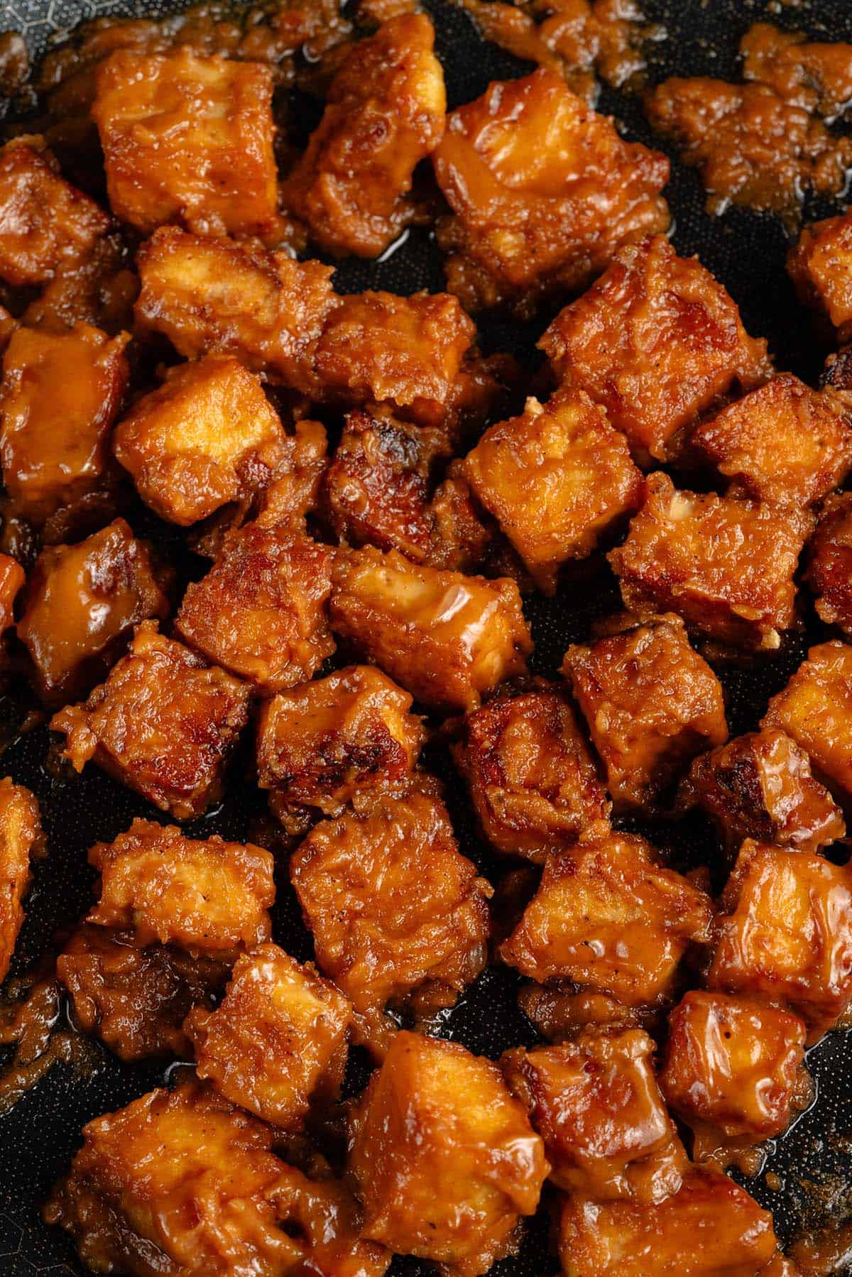 overhead photo of prepared peanut tofu in pan