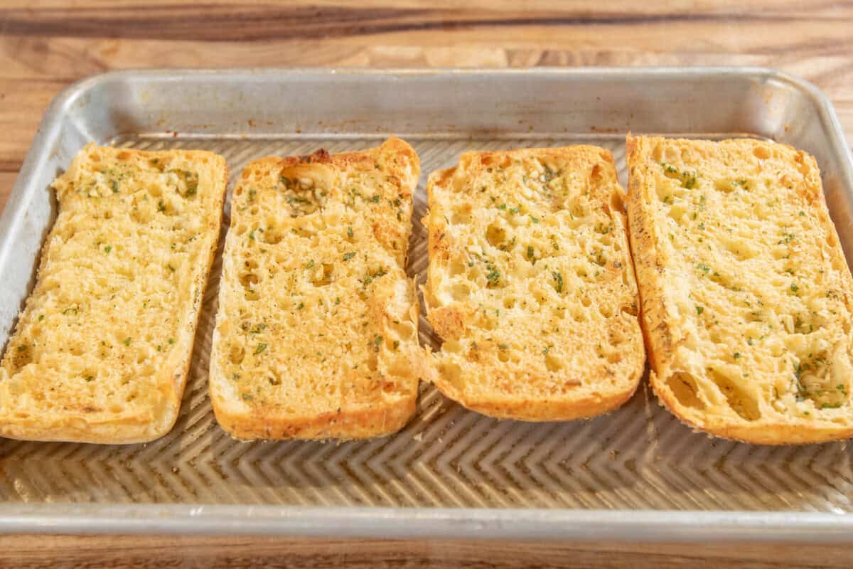 baked garlic bread on baking sheet