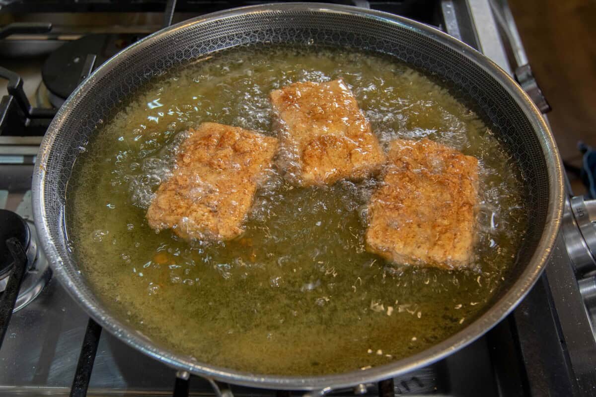 golden fried tofu cutlets in oil
